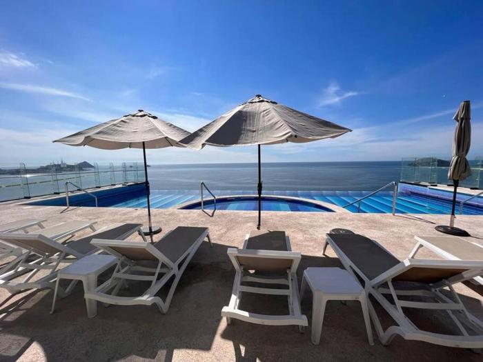 Super depa sobre el malecon alberca infinity