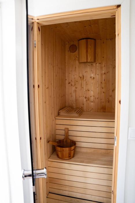 Your own 30sqm house with kitchen, sauna and loft.