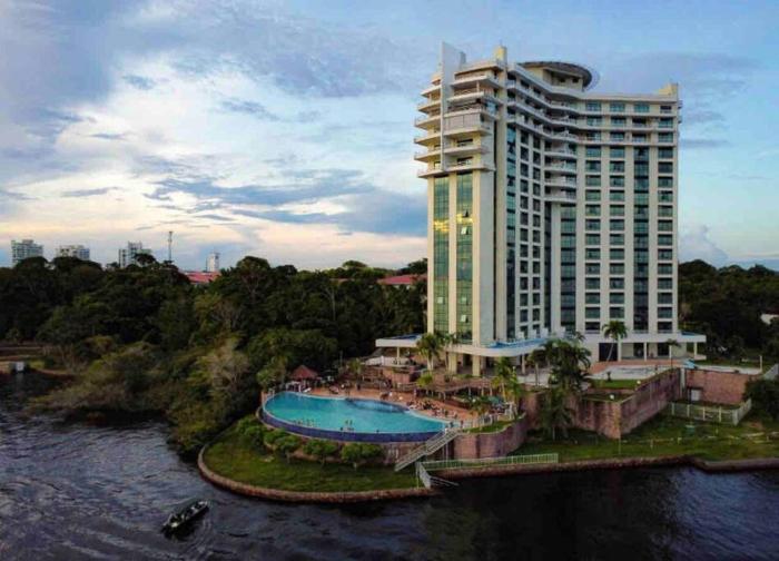 Flat em Tropical Executive Hotel
