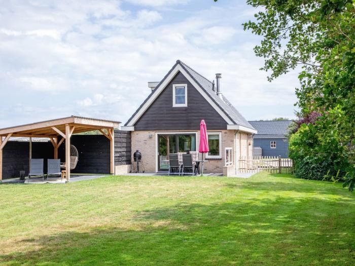 Holiday home near dunes with wellness garden