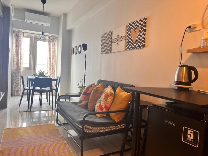 CozyCoastStay by APPLETRAVELBEYONDPH