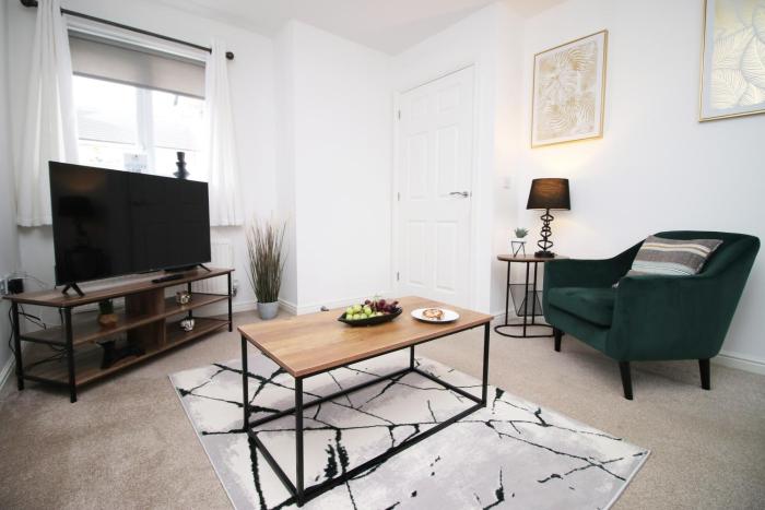 Beautiful modern house with free parking and fast WiFi next to Swansea Stadium and Morfa Park Shopping Centre hosted by Our Home Short Stays