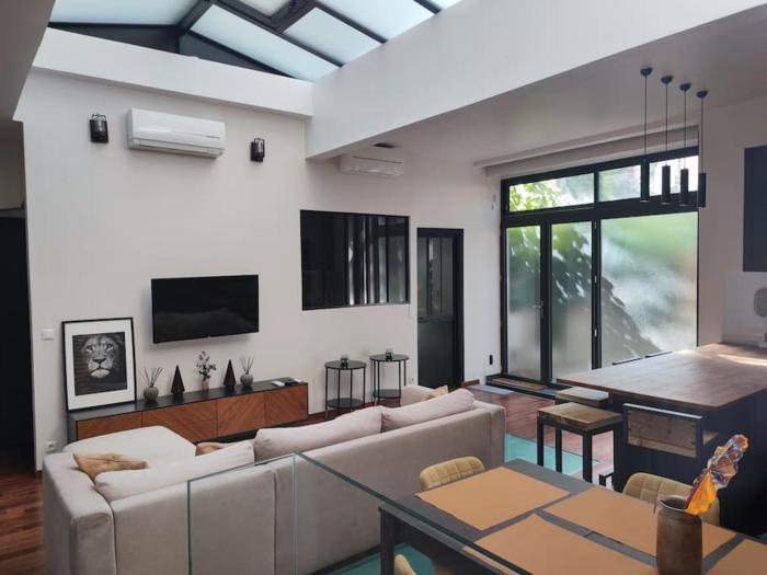 Loft Paris centre face au parc des buttes Chaumont