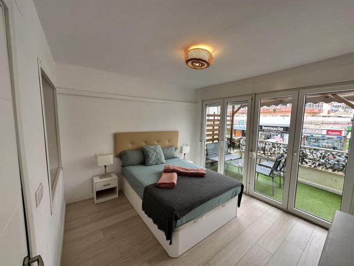 Central Apartment with Terrace & Seasonal Pool Walking Distance to the Beach by Namaste Elite