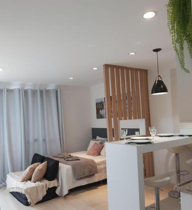 Lindo studio equipado em apartamento clube com piscina aquecida e academia no centro de Curitiba - MID Home