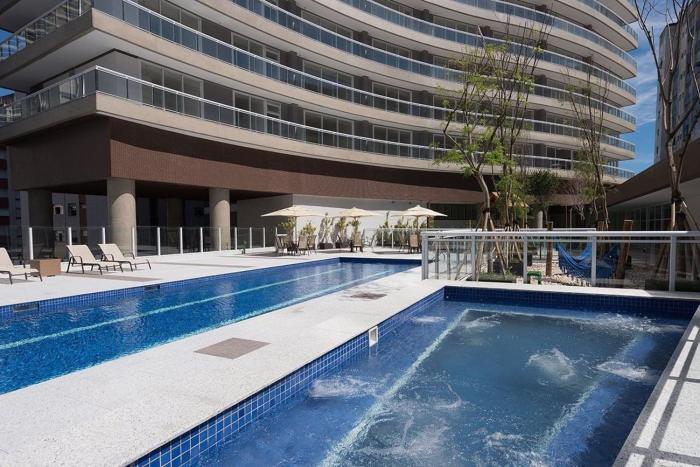 Studio moderno em condomínio de luxo pé na areia