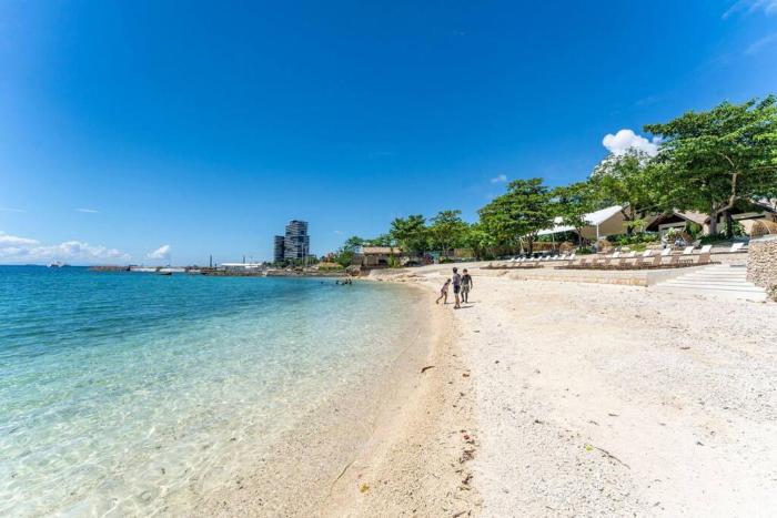 OMP 17J-T1, Seaview, Beach, Pool Access,Near Airport, Fast Wi-fi, Netflix