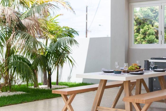 The Elements l Air l 4 Stunning Apartments each with Private Outdoor Dining l Walk to the Beach l Event Friendly l Wifi l Netflix l Outdoor Shower l Communal BBQ Pavilion and Lawn Area l