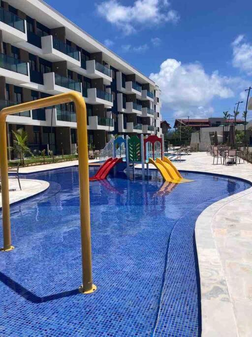 Resort em Porto de Galinhas- Flat Térreo Frente Piscinas- Muro Alto-B18