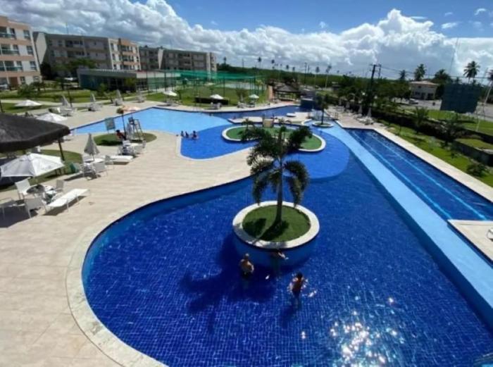 Muro Alto Condomínio Clube – Flats completos para a família por Yolo