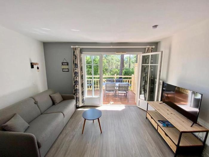 Appart moderne grande piscine Lacanau océan pinède