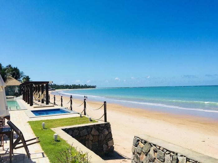 FLAT ENCANTADOR PÉ NA AREIA 2 SUÍTES- WATERFRONT