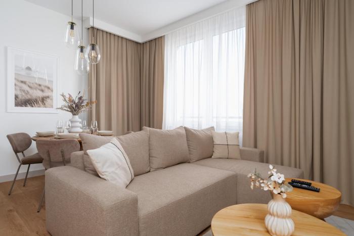 Stylish Beige Apartment with One Bedroom and Parking in PoznaÅ„ by Renters