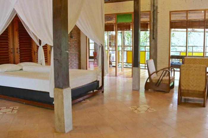 Riverside villa in tropical setting