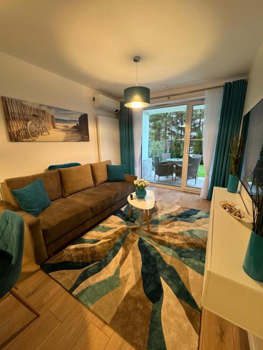 Apartament Whiteblue Dream 2 Kołobrzeg z ogródkiem & sauna & fitness & bawialnia dla dzieci