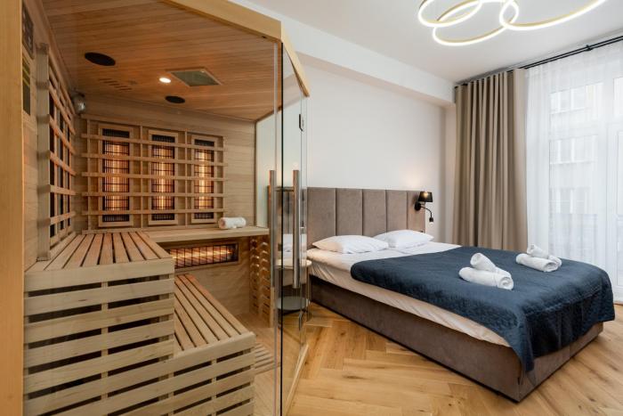 Luxury apartment with a sauna and bedroom with bath
