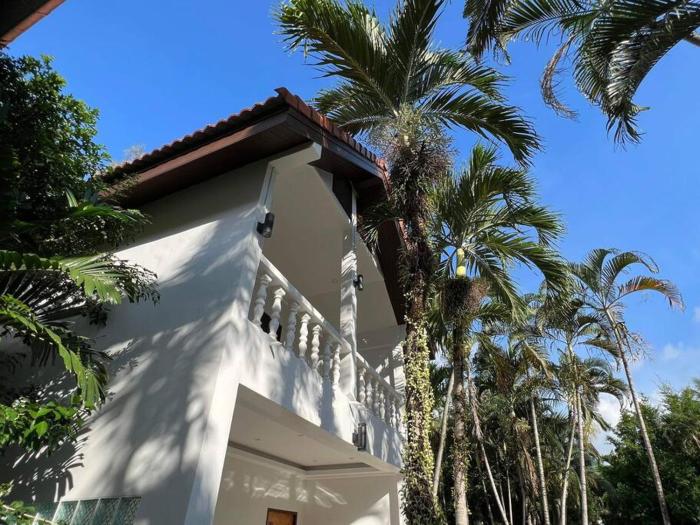 Charming Villa Suite with Balcony near Beach