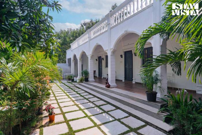 Agam Villa by VEO, StayVista - 5BHK with Shared Pool & Lawn