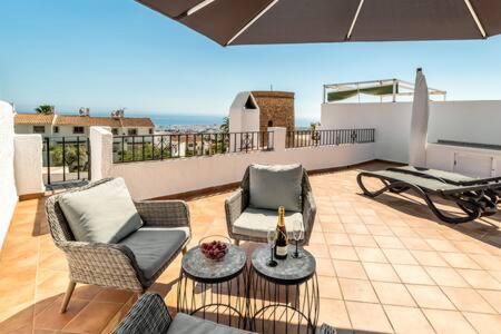 Hermosa casa con terraza e increíbles vistas al mar y la montaña