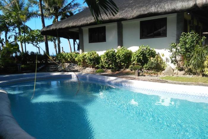 Beachfront house in Baua with swimming pool.