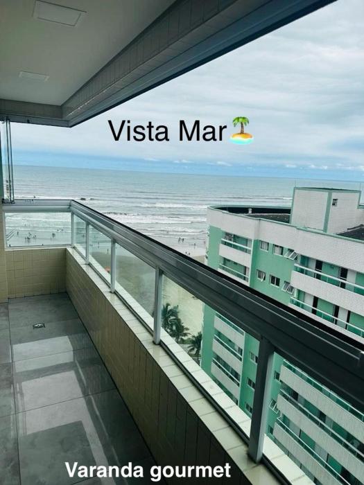 APTO BEIRA MAR - ACONCHEGANTE _ VARANDA GOURMET - WIFI - NETFLIX - TV A CABO - PRAIA GRANDE
