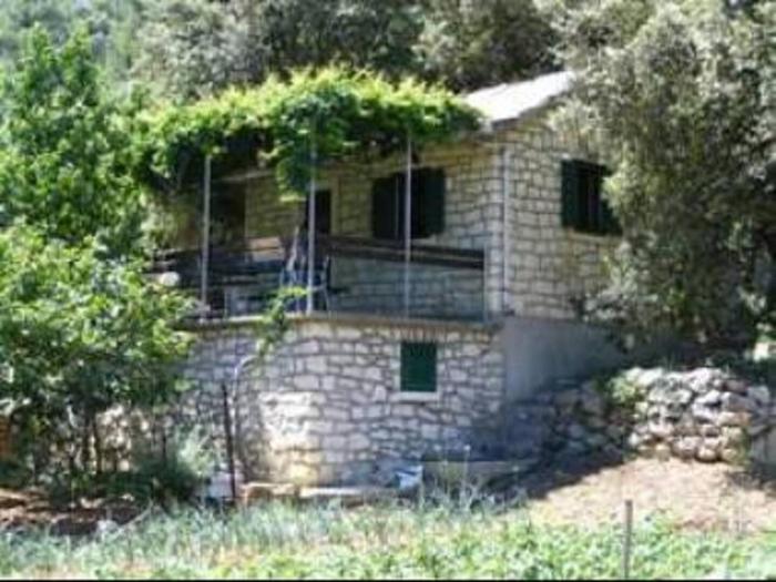 Secluded house with a parking space Postira, Brac - 22203