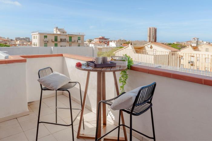 Suite Attico in Centro - Parcheggio Gratuito