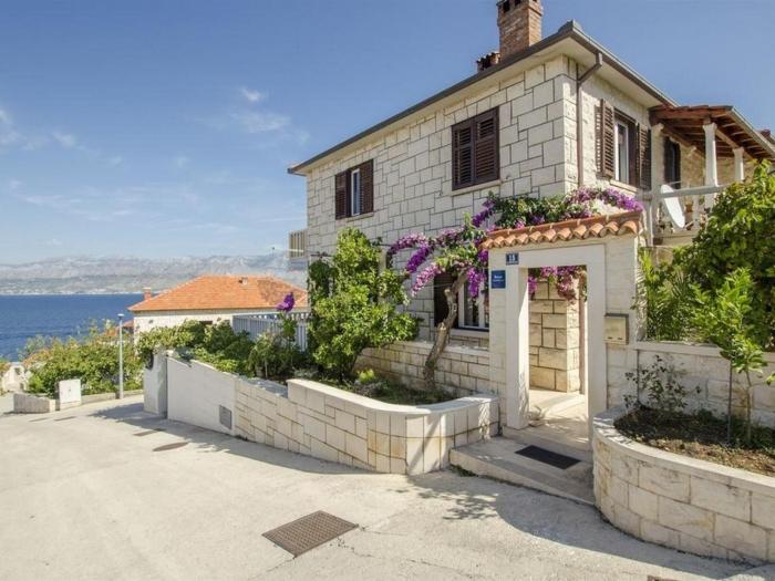 Apartments by the sea Postira, Brac - 22356