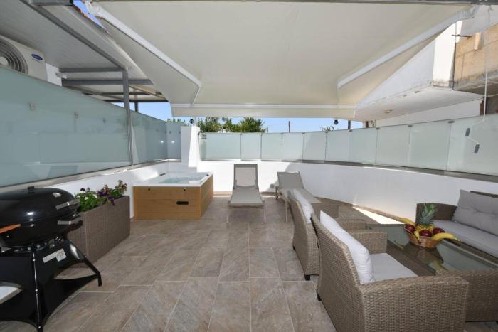 A comfy studio with hot tub