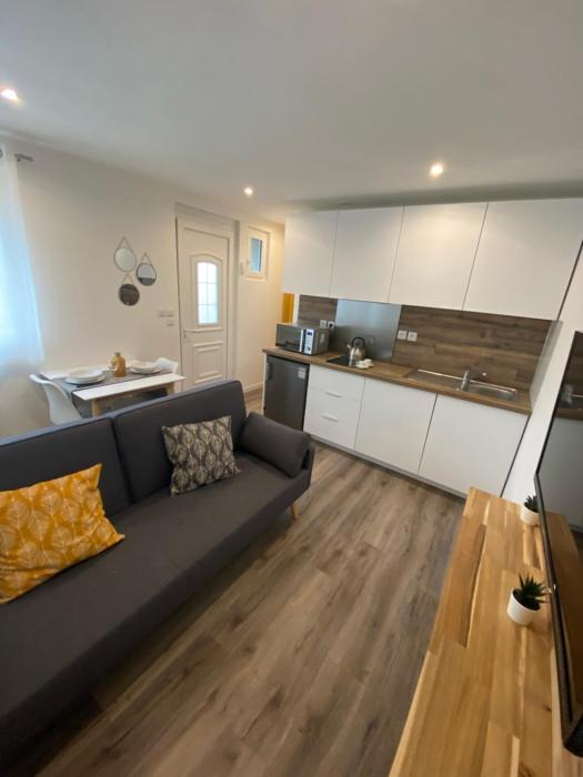 Studio neuf avec jardin privatif