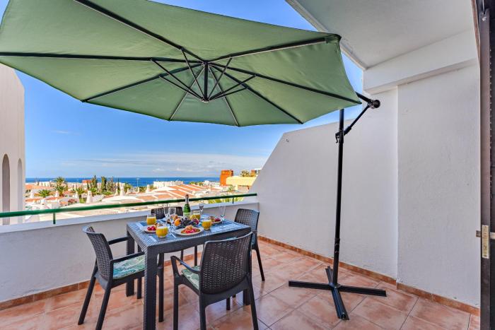 Heated Pool Costa Adeje in front of a beach