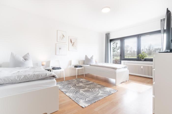 MR Living I moderne Apartments mit Einzelbetten, voll ausgestattete Küche, WLAN, Parkplatz, ideal für Monteure I DR01, DR02
