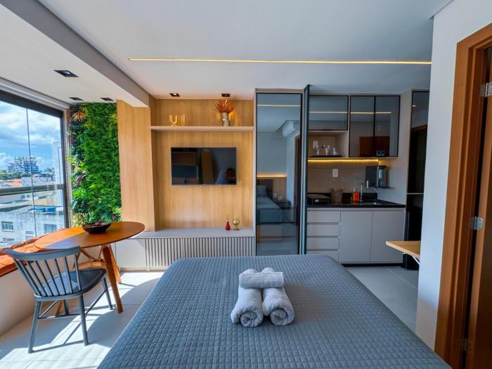 Studio 250mts da PRAIA I Piscina com VISTA PANORÂMICA em ROOFTOP I ACADEMIA I HOME OFFICE I WiFi 100Mbps