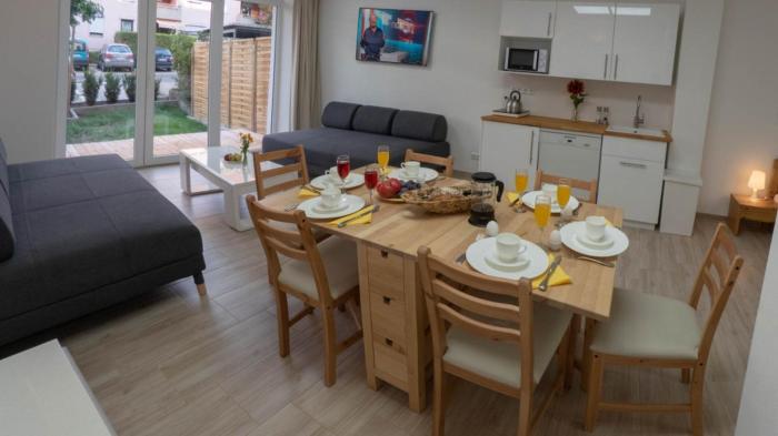 Eleonoras Ferienwohnung in Würzburg Stadt mit Terrasse im Erdgeschoss inklusive eigenen Parkplätzen vor der Tür