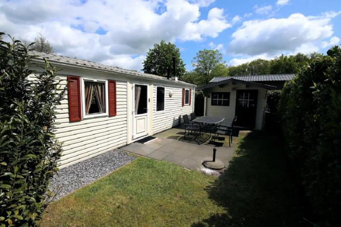 Charmante woning op rustig park met fietsen