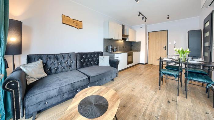 Apartament Przy Porcie z klimatyzacją, garażem i rowerami