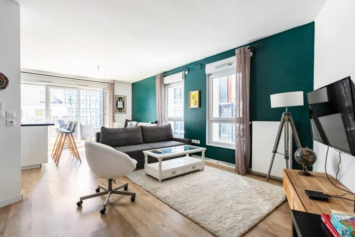 Grand appartement , Paris la Défense Arena, 50 mètres de la gare, 15 min Champs elysées