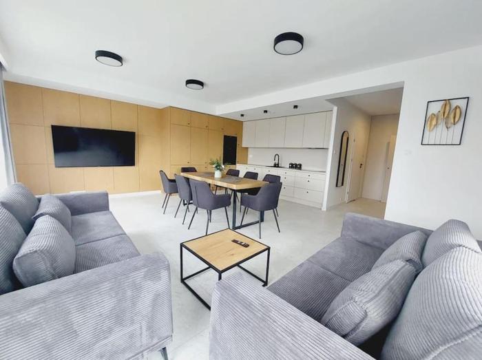 Przestronny apartament, ogródek, bezpłatne miejsca postojowe w garażu, AWG APARTMENTS