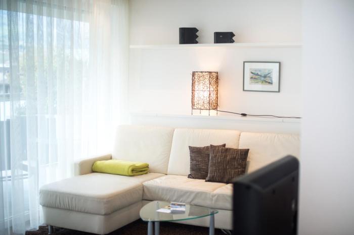 Residence Ferienwohnungen Santner - Moderne zentrale Ferienwohnungen in Naturns Südtirol - mit Parkplatz