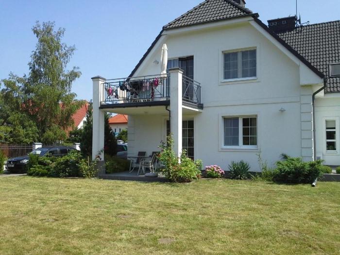 Wohnung in Rowy mit Grill, Terrasse, Parkplatz und Garten