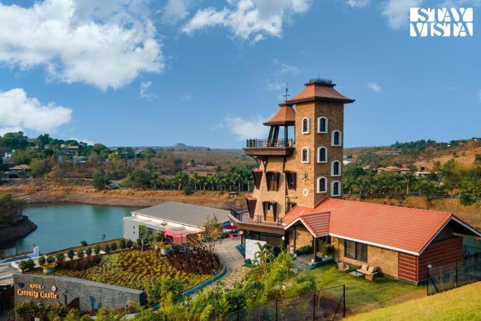 StayVistas Cerenity Castle - Lakeside Haven with Hill-View, Terrace & Indoor Entertainment