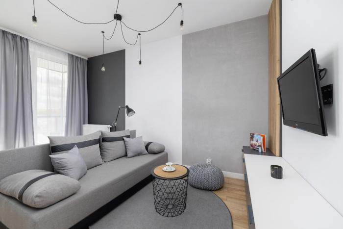 Black and Grey Apartment in Cracow with Balcony, Parking and Desk by Renters