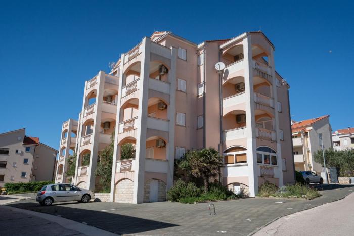 Apartments with a parking space Novalja, Pag - 22146