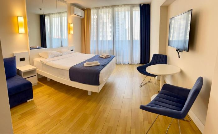 Orbi City sunny cozy apartment