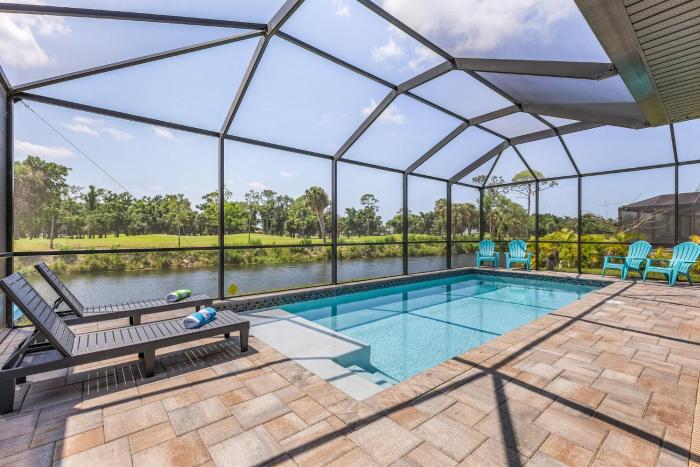 Close to Golf! Freshwater Canal home with Heated Pool - Villa Hole in One Haven