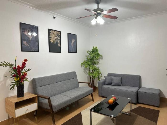 2BR Condo w free parking near SM North