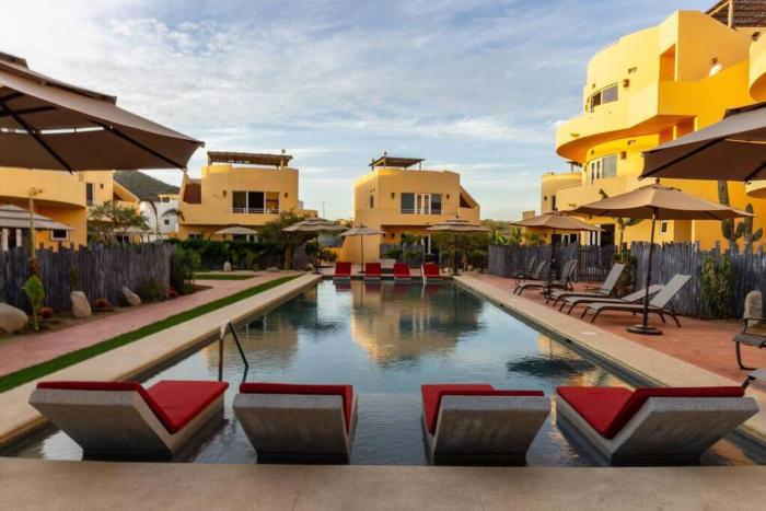 9A Poolside Private Patio Cerritos Beach Condo