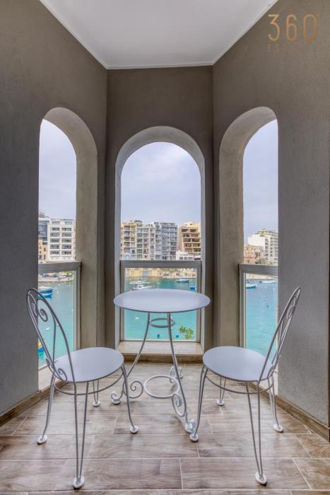 One of a kind, 1BR seafront home in St Julians by 360 Estates