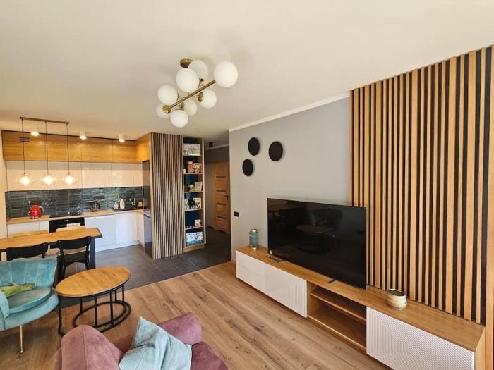 Apartament przy Loftach u Scheiblera parking podziemny, Śniadaniownia