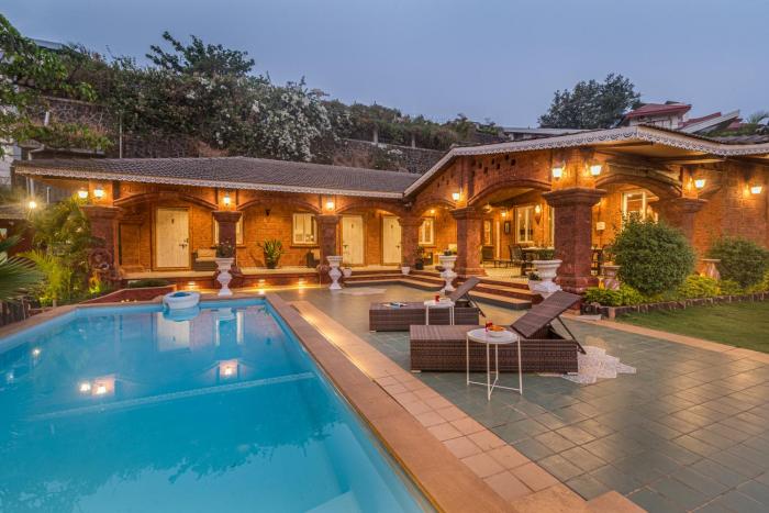 SaffronStays Chira-5BR heritage villa with laterite stone walls, verandah sit-outs & private pool